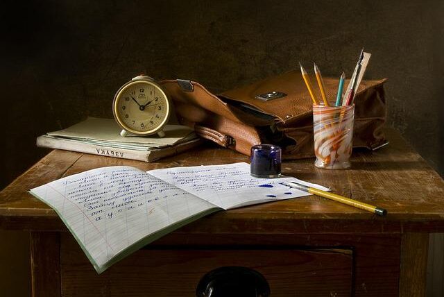 table and book for writing short stories